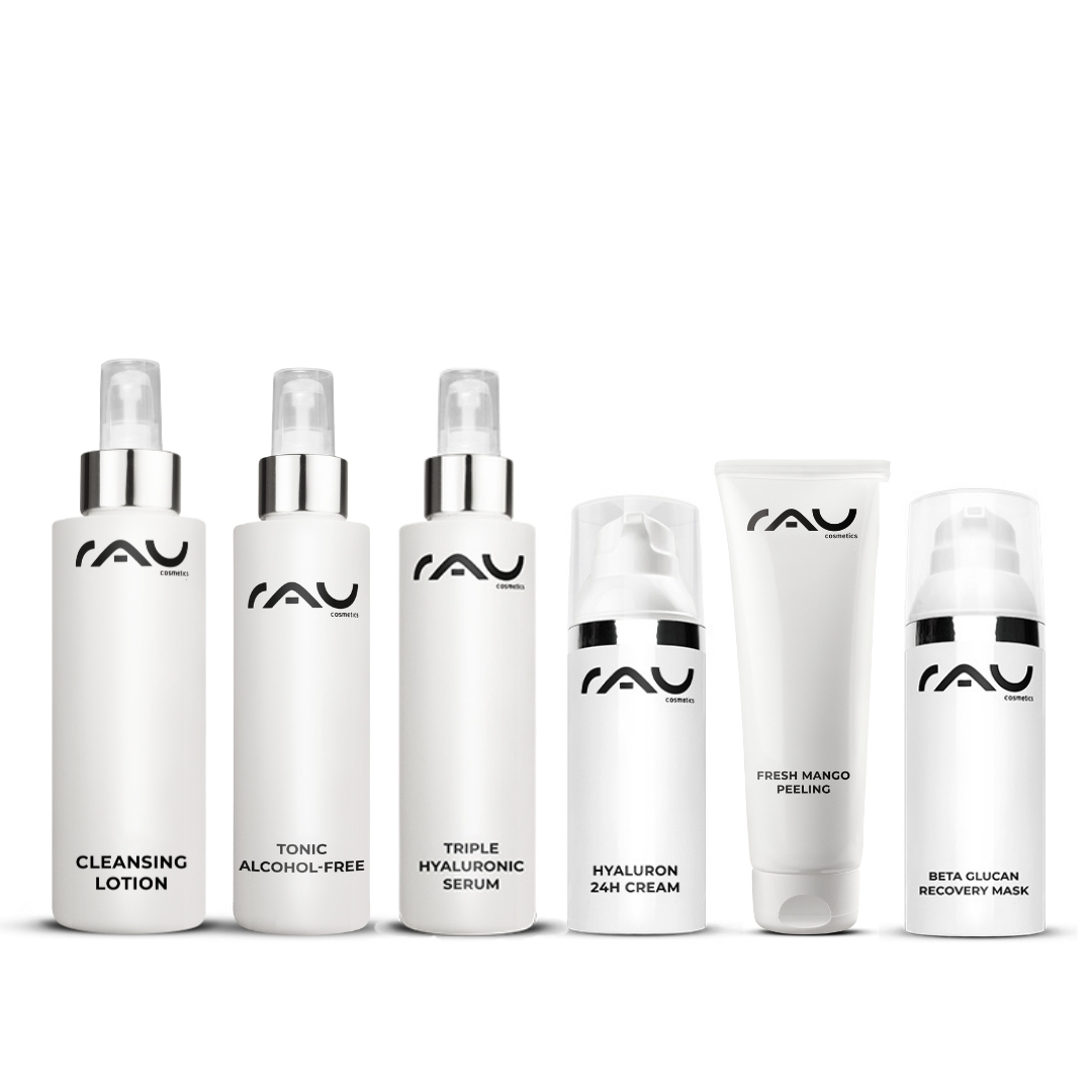 Routine di cura professionale per la pelle secca RAU Cosmetics Hautpflegeset mit Reinigungslotion, alkoholfreiem Tonic, dreifachem Hyaluronserum, Hyaluron 24H-Creme, Fresh Mango Peeling und Beta Glucan Recovery Mask, entwickelt für die Pflegeroutine trockener Haut.